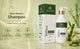 Aurrelis Green Bamboo Strength Shampoo bottle showing the label, designed for nourishing and strengthening hair.
